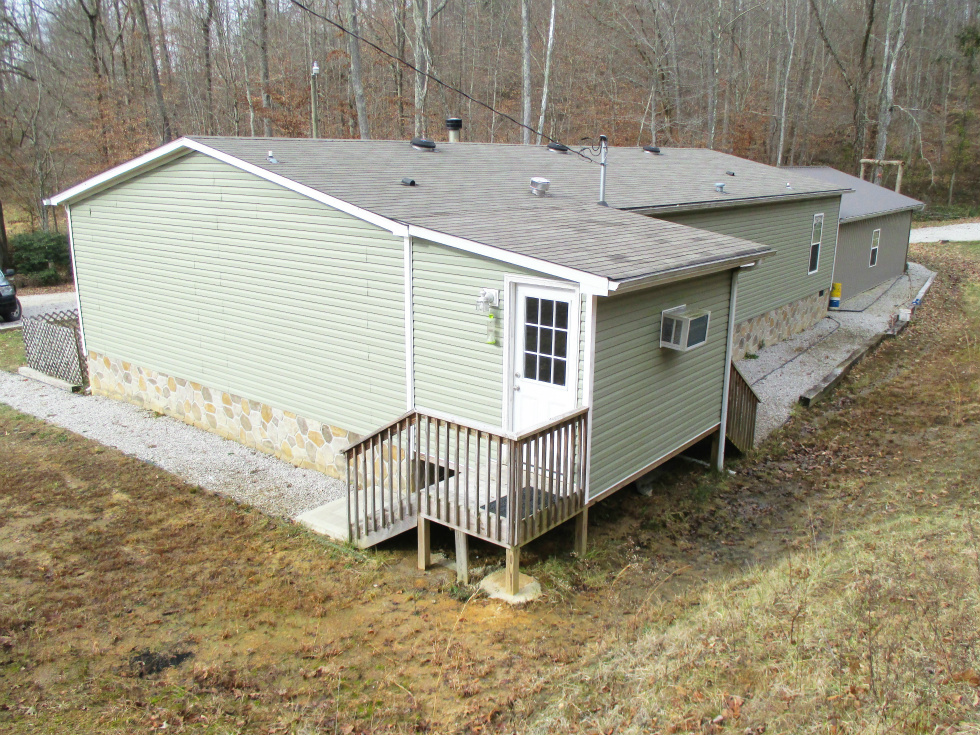 SOLD!  2694 Buck Creek Road | : 28’X60’ KABCO doublewide located on 20 acres +/-. 4 bedrooms, 2 baths 