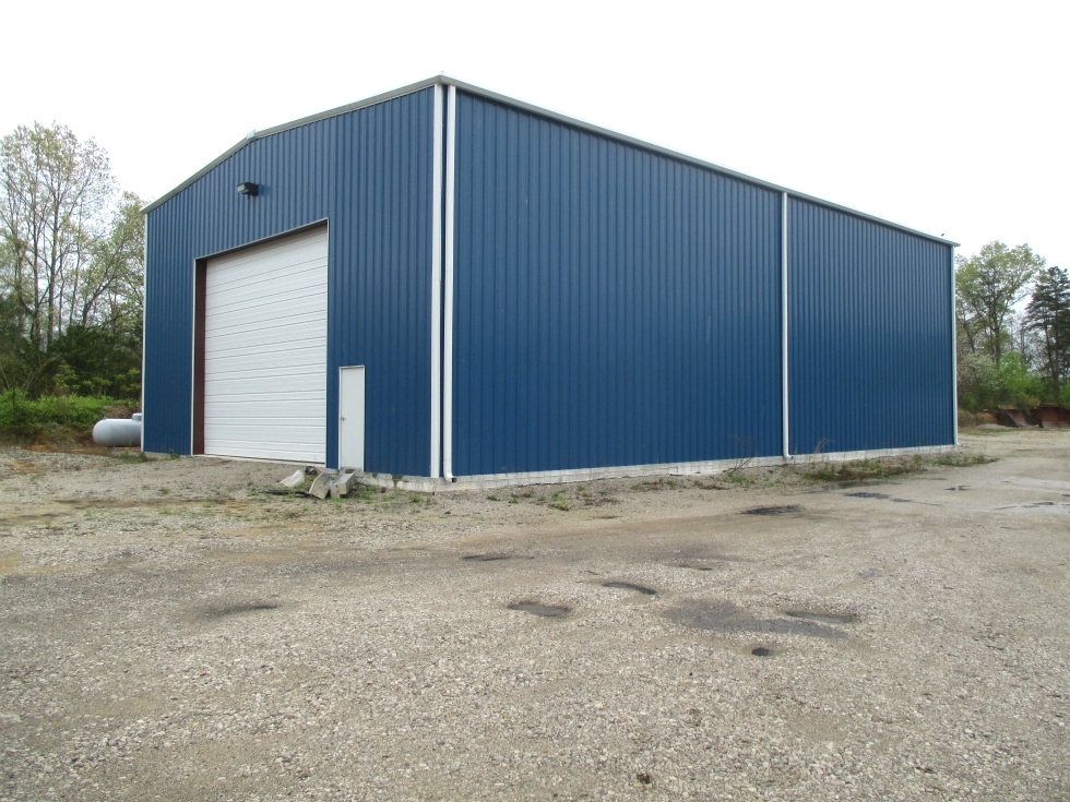 Sold! Commercial property: Equipment repair, storage and office space. 
