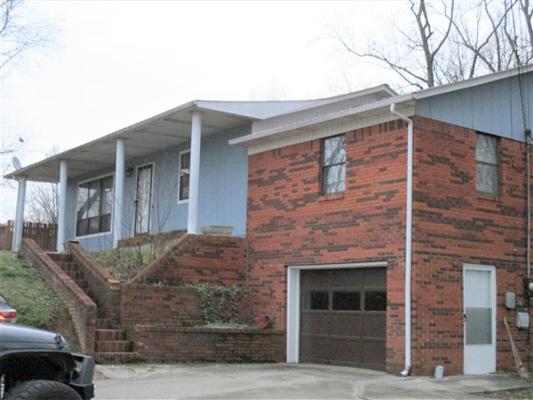 Sold! Pine Knot, KY Home - SOLD! ! 1600 SF +/- siding - brick home with a metal roof sitting on a 1 acre lot.  